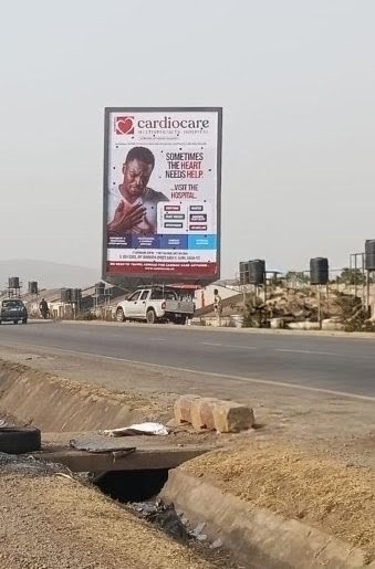 Roadside billboard on the Nyanya-Keffi Expressway, Abuja